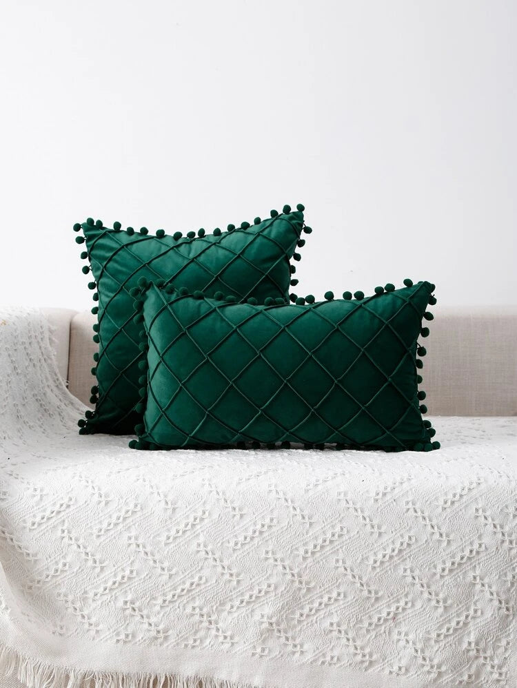 Housse de coussin avec pompons