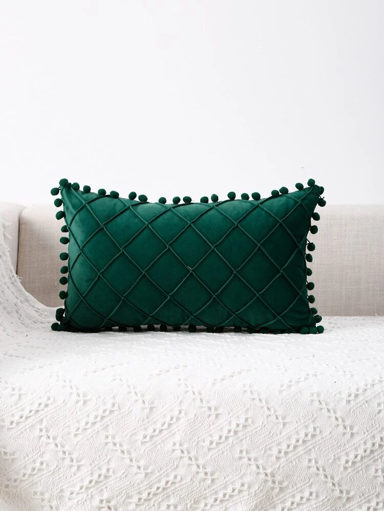 Housse de coussin avec pompons