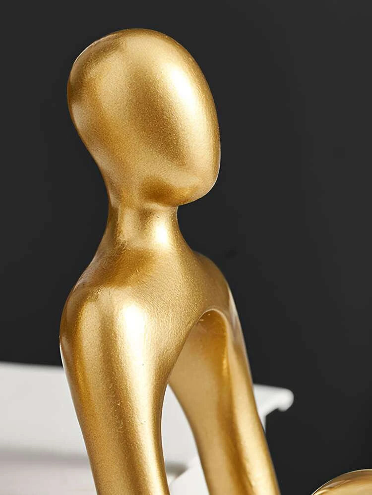 Sculpture mannequin doré